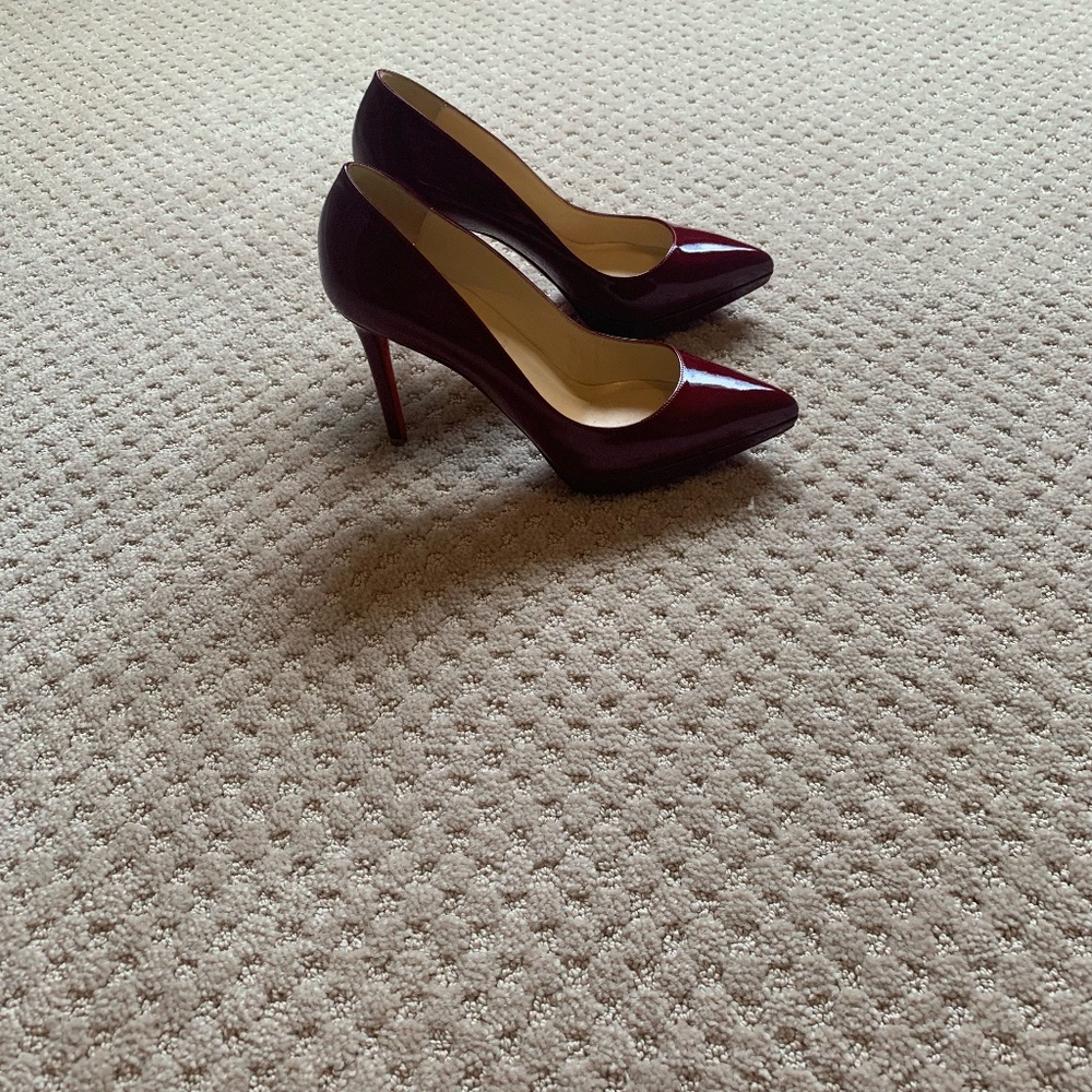 Louboutin patent leather pumps, size 38, dark red